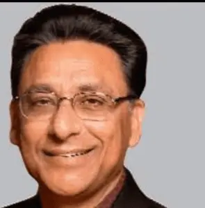  Vinod Dham a man wearing glasses and smiling